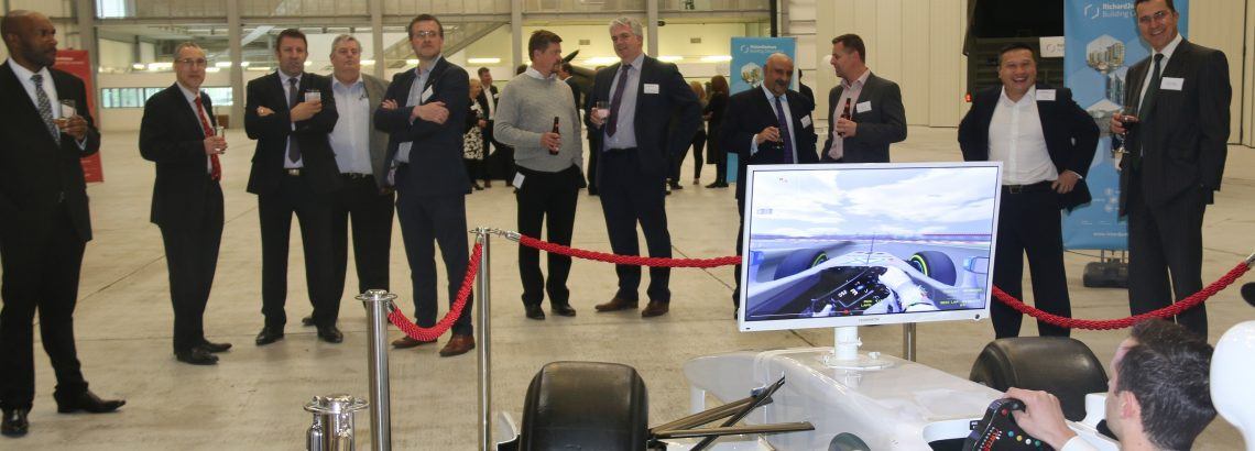 A photograph of lots of people standing and chatting at an event | Smarter Travel Limited