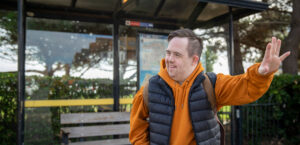 man hailing a bus